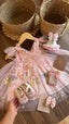 Outfit vestido rosa con Alas de Ensueño
