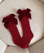 Medias Largas Rojo Velvet – Con Lazo | Calcetines | Ropa de bebé y niña | El Closet de Emma