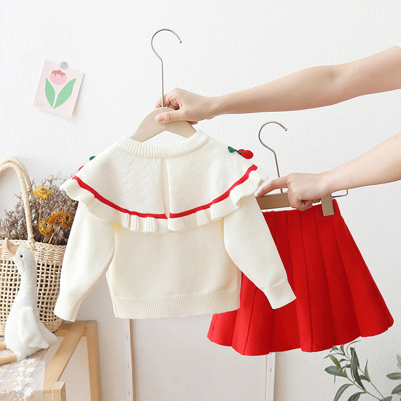 Conjunto Cerezo Encantado – Suéter Tejido con Falda Roja 🍒