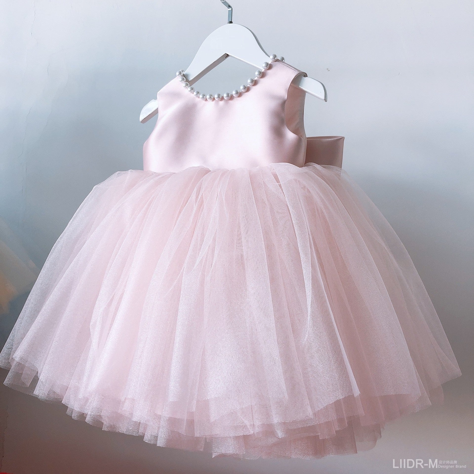 Vestido Tul Rosa para Bebé con Lazo Grande y Perlas | Cumpleaños y Fiesta
