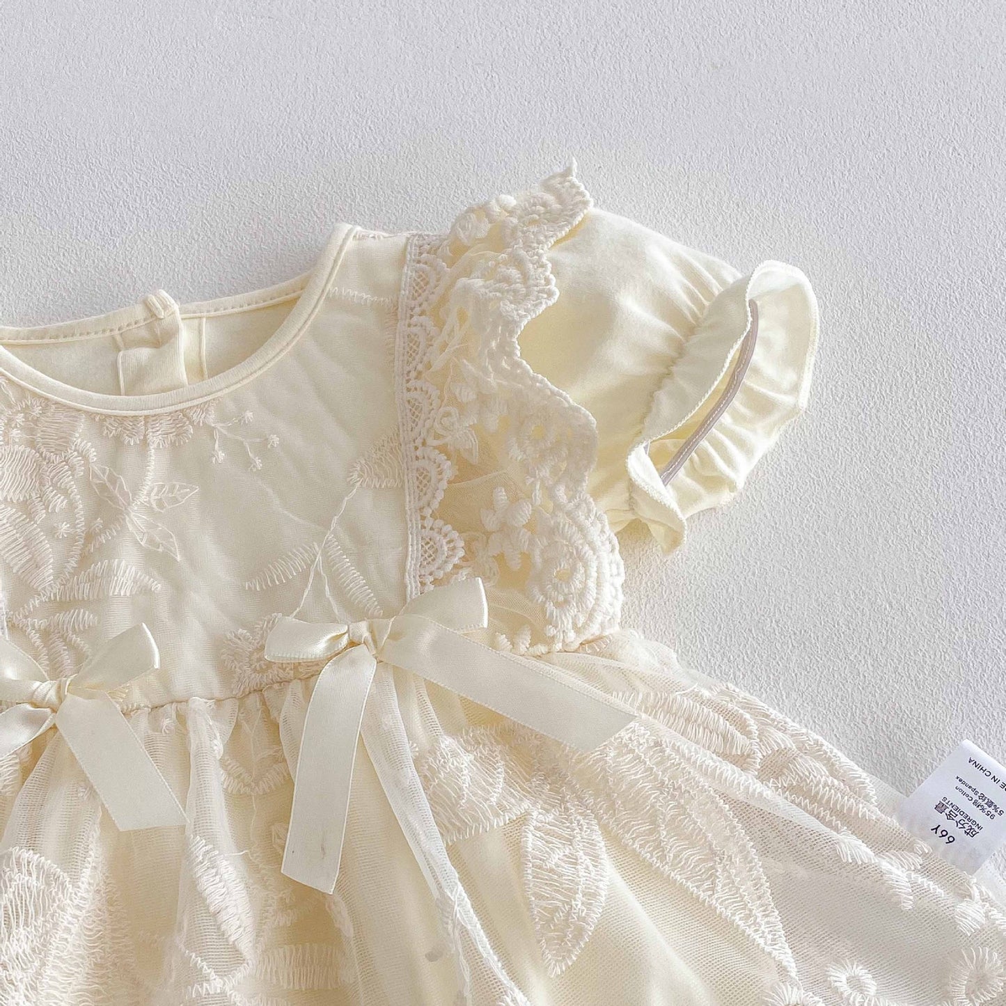 Vestido Ivory Encaje Floral con Lazos – Verano