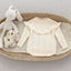Romper Tejido Ivory con Volantes y Relieve Floral