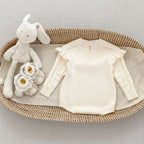Romper Tejido Ivory con Volantes y Relieve Floral