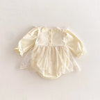 Vestido de Encaje Marfil con Bordado Floral y Lazos