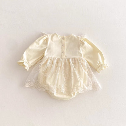 Vestido de Encaje Marfil con Bordado Floral y Lazos