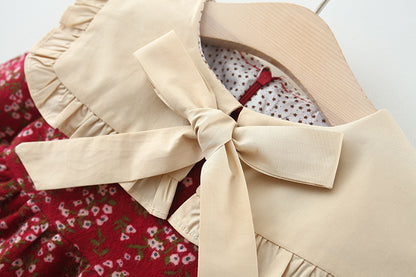 Vestido Rojo Floral con Cuello Beige y Lazo Elegante