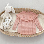 Romper Tejido Rosa Empolvado con Volantes y Relieve Floral