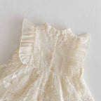 Romper Vestido Ivory Bordado Floral – Encanto Delicado