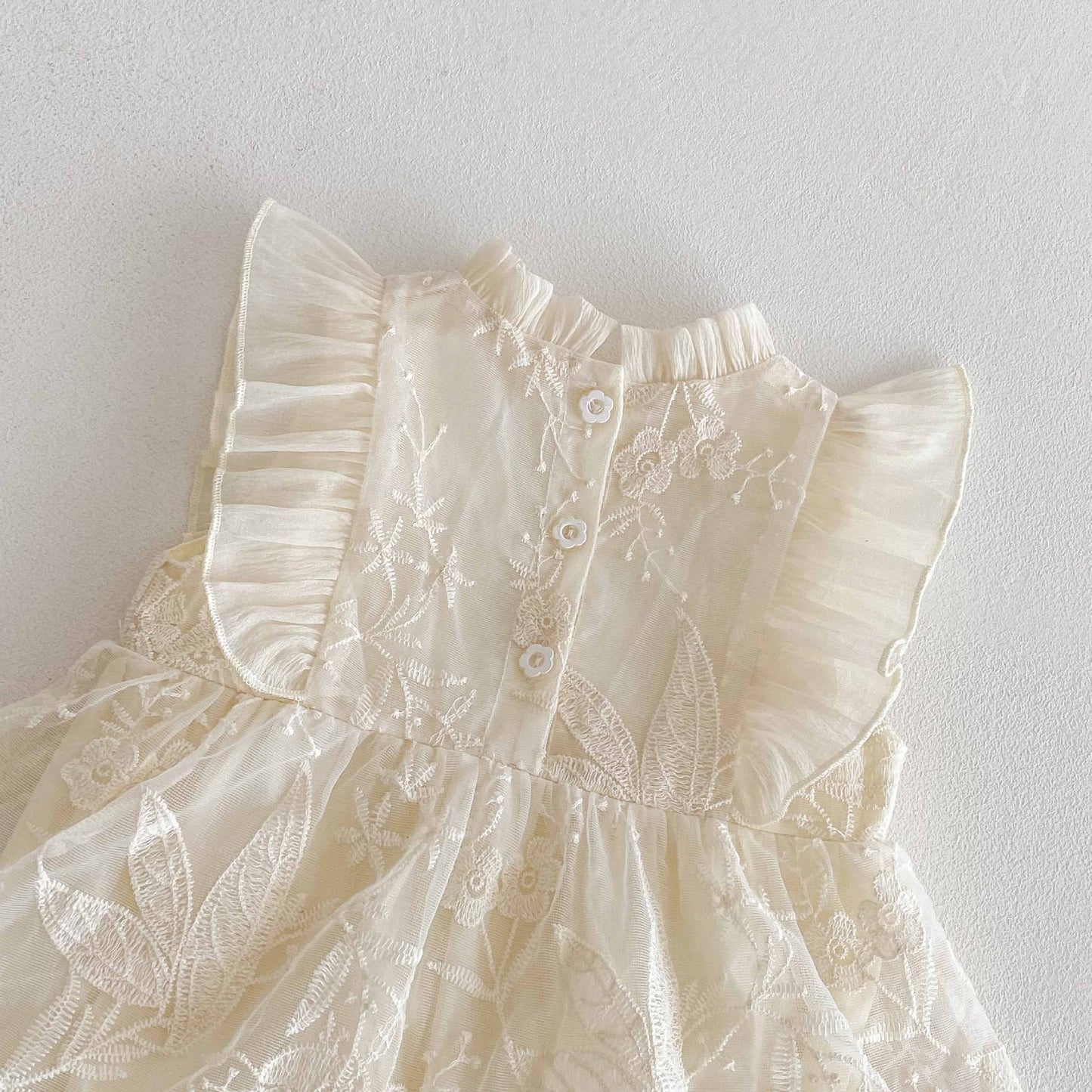 Romper Vestido Ivory Bordado Floral – Encanto Delicado