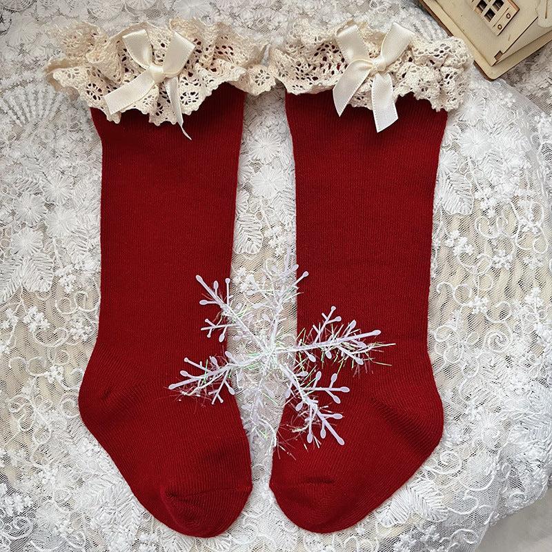 Medias Rojas con Encaje y Lazo – Colección Encanto Navideño 🎀❄️ Imagen principal del producto