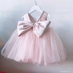 Vestido Tul Rosa para Bebé con Lazo Grande y Perlas | Cumpleaños y Fiesta