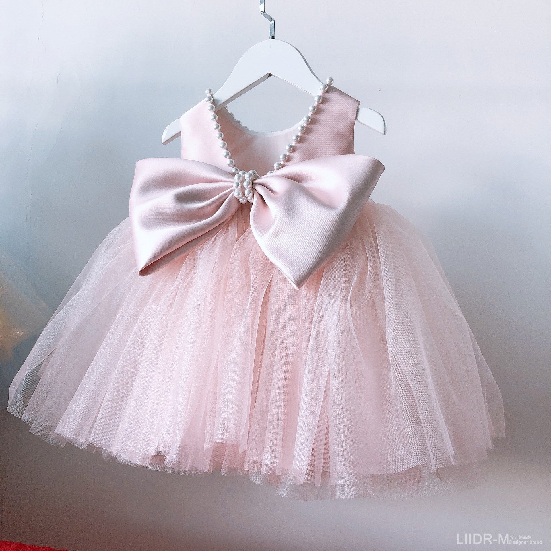 Vestido Tul Rosa para Bebé con Lazo Grande y Perlas | Cumpleaños y Fiesta