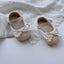 Zapatos Baby Ivory con Lazo Clásico – Elegancia Atemporal