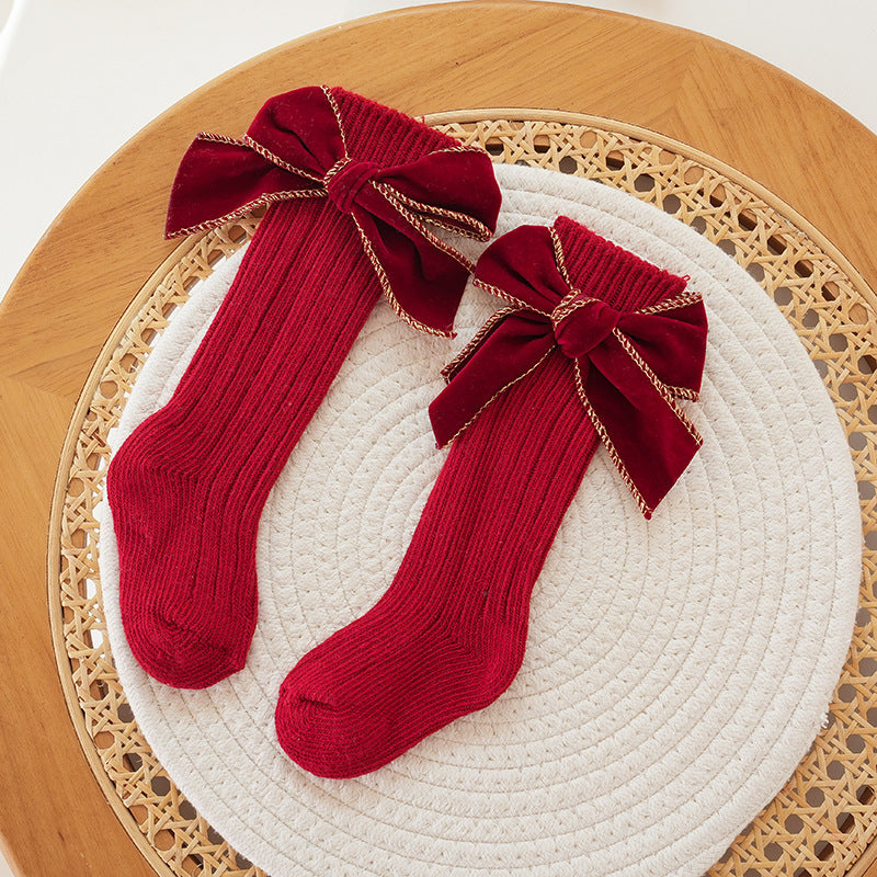 Medias Burdeos con Lazo de Terciopelo y Detalle Dorado