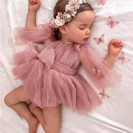 Vestido Rosa con Mangas de Tul y Moño – Magia en Sueños y Momentos Especiales