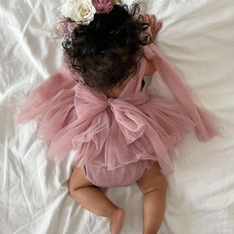 Vestido Rosa con Mangas de Tul y Moño – Magia en Sueños y Momentos Especiales