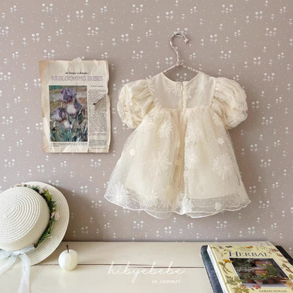 Vestido de Tul Bordado Color Marfil con Mangas Abullonadas