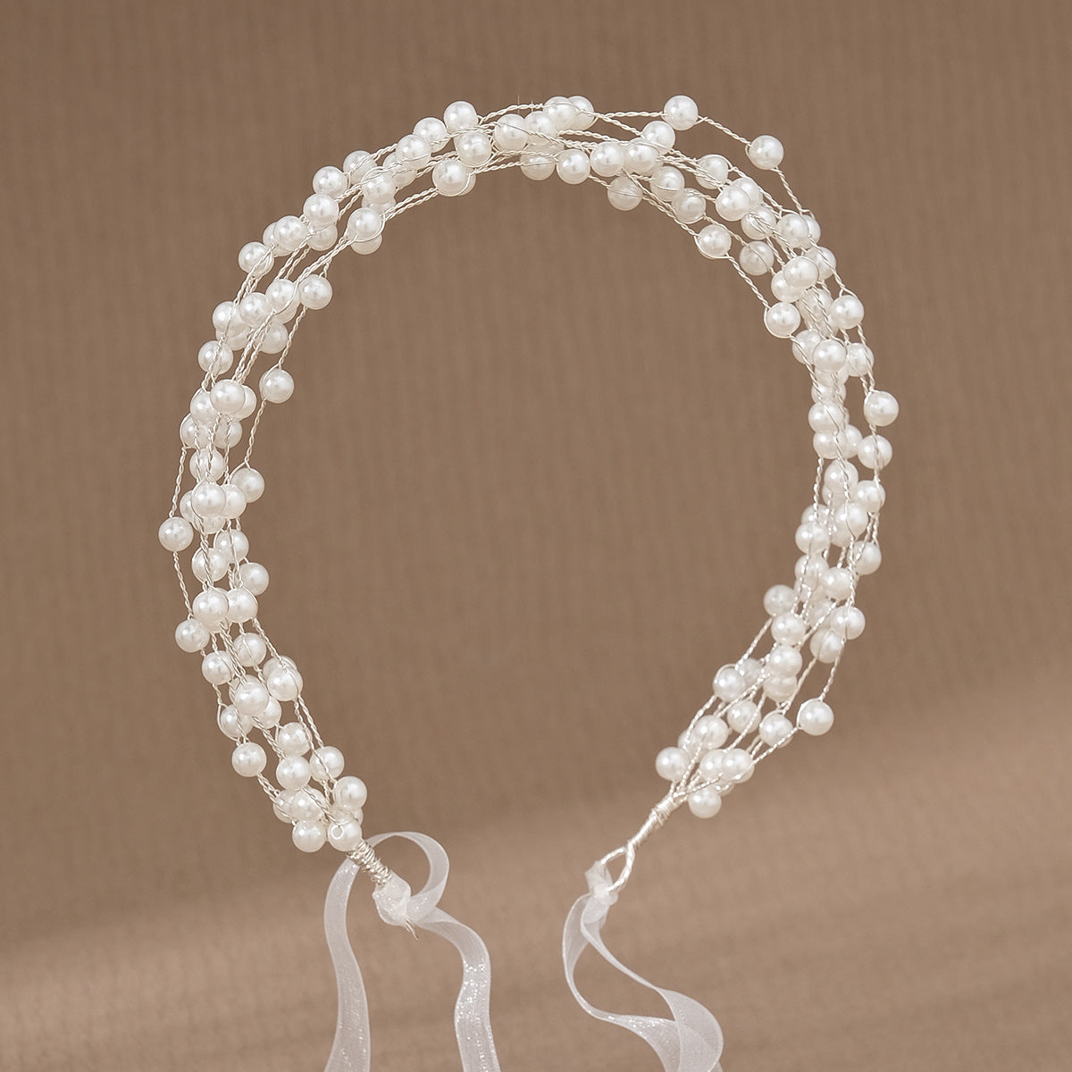 Diadema de Cintas con Perlas Elegantes