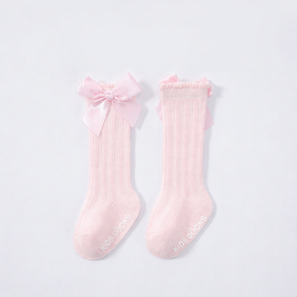 Medias Altas Rosadas con Lazo – Dulzura Clásica Imagen principal del producto